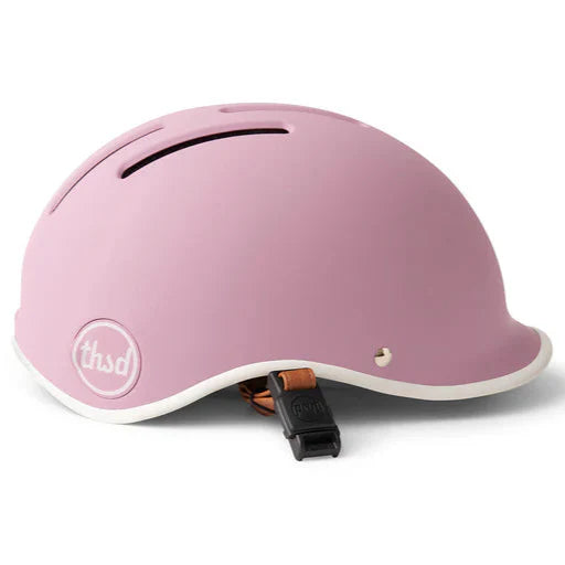 Pink helmet with a thousand logo on a white background