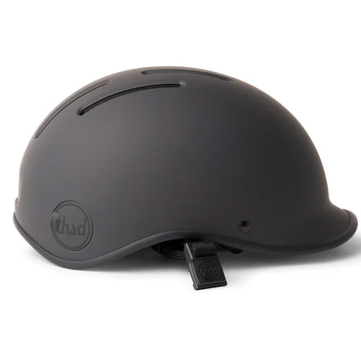 Fully black Thousand helmet on a white backdrop.