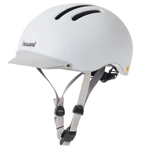 White helmet with black Thousand branding on a white background